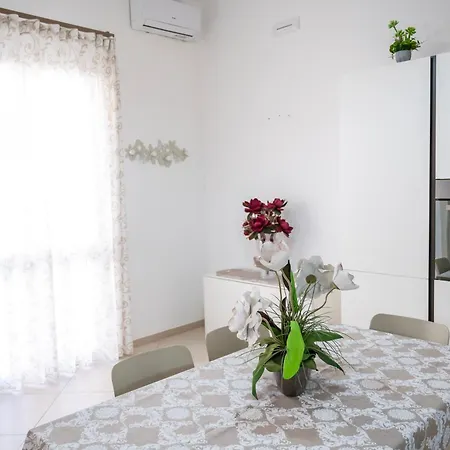 Tomasi House